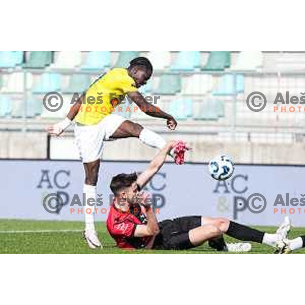 Venuste Baboula and Zan Besir in action during Prva liga Telemach 2024/2025 football match between Primorje and Bravo Big Bang in Ajdovscina, Slovenia on April 10, 2025