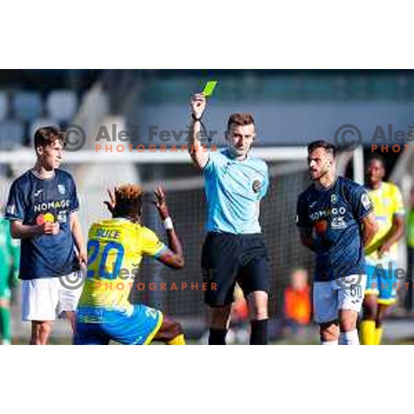 Referee Denis Halilovic shows yellow card to Wisdom Sule of Koper at Prva liga Telemach 2024/2025 football match between Koper and Bravo Big Bang at Bonifika Stadium in Koper, Slovenia on April 19, 2025