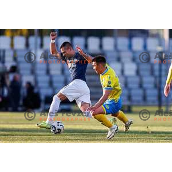 Jakoslav Stankovic of Bravo and Veljko Mijailovic of Koper in action at Prva liga Telemach 2024/2025 football match between Koper and Bravo Big Bang at Bonifika Stadium in Koper, Slovenia on April 19, 2025