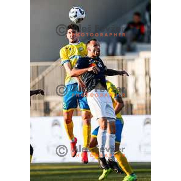 Matej Poplatnik of Bravo and Fran Tomek of Koper in action at Prva liga Telemach 2024/2025 football match between Koper and Bravo Big Bang at Bonifika Stadium in Koper, Slovenia on April 19, 2025