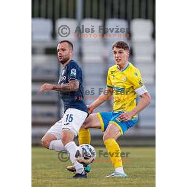 Matej Poplatnik of Bravo and Maj Mittendorfer of Koper in action at Prva liga Telemach 2024/2025 football match between Koper and Bravo Big Bang at Bonifika Stadium in Koper, Slovenia on April 19, 2025