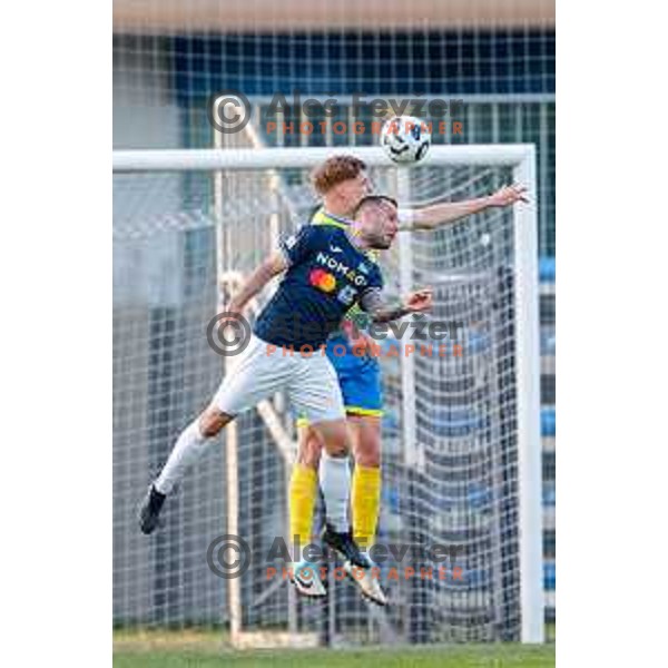 Matej Poplatnik of Bravo and Maj Mittendorfer of Koper in action at Prva liga Telemach 2024/2025 football match between Koper and Bravo Big Bang at Bonifika Stadium in Koper, Slovenia on April 19, 2025