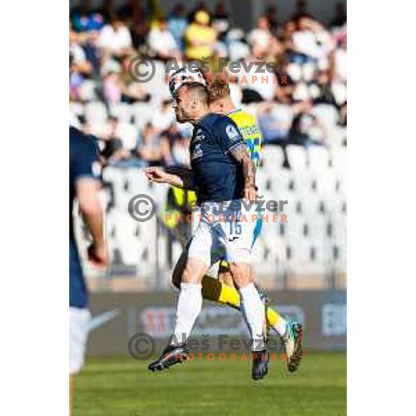 Matej Poplatnik of Bravo and Maj Mittendorfer of Koper in action at Prva liga Telemach 2024/2025 football match between Koper and Bravo Big Bang at Bonifika Stadium in Koper, Slovenia on April 19, 2025