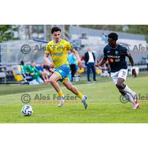 Kamil Manseri of Koper and Venuste Babuola in action during semi-final of Pivovarna Union Slovenian Cup 2024/2025 football match between Koper and Bravo Big Bang at Bonifika Stadium in Koper, Slovenia on April 23, 2025