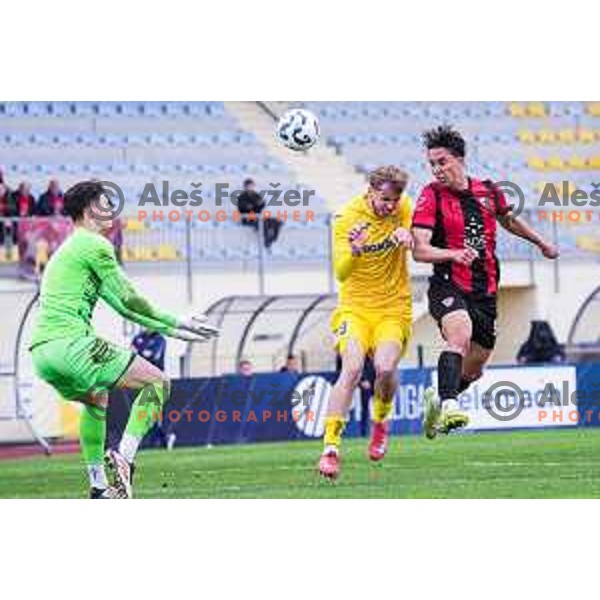 Haris Kadric scores a goal over Nino Milic and Lovro Stubljar during Prva liga Telemach 2024/2025 football match between Domzale and Primorje in Domzale, Slovenia on April 26, 2025