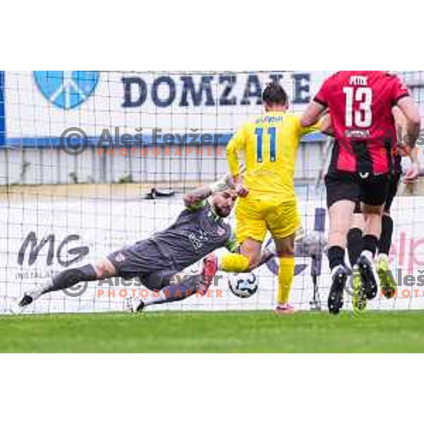 Josip Posavec and Luka Mlakar in action during Prva liga Telemach 2024/2025 football match between Domzale and Primorje in Domzale, Slovenia on April 26, 2025