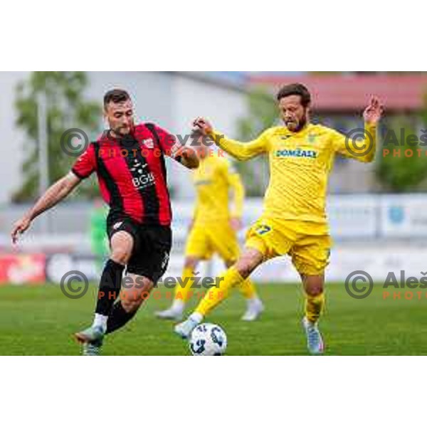 Haris Dedic and Dejan Lazarevic in action during Prva liga Telemach 2024/2025 football match between Domzale and Primorje in Domzale, Slovenia on April 26, 2025