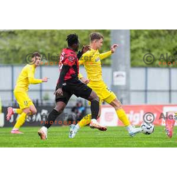 Ishag Rafiu and Marcel Lorber in action during Prva liga Telemach 2024/2025 football match between Domzale and Primorje in Domzale, Slovenia on April 26, 2025