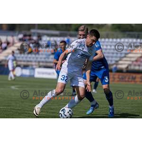 Veljko Mijailovic and Amadej Marinic during Prva liga Telemach 2024/2025 football match between Mura and Domzale in Fazanerija Murska Sobota, Slovenia on April 10, 2025 Photo: Sebastijan Andrejek Bukovec