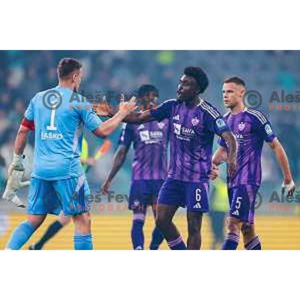 Azbe Jug and Bradley M\'Bondo celebrate a victory at Prva liga Telemach 2024/2025 football match between Olimpija and Maribor in Ljubljana, Slovenia on May 3, 2025