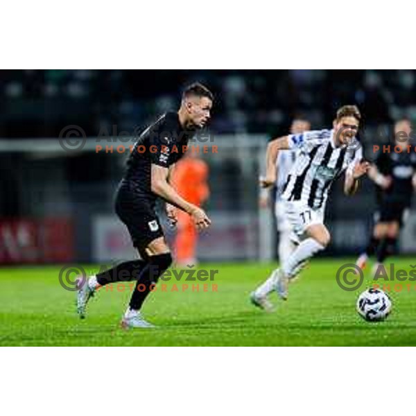 in action during Prva liga Telemach 2024/2025 football match between Mura and Olimpija in Murska Sobota, Slovenia on May 10, 2025