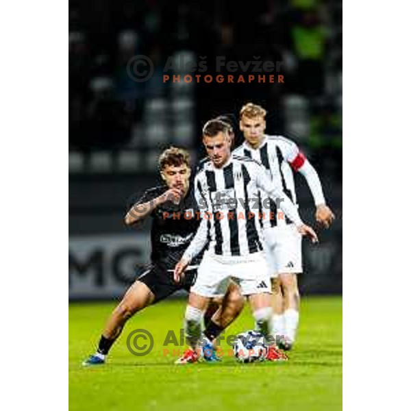in action during Prva liga Telemach 2024/2025 football match between Mura and Olimpija in Murska Sobota, Slovenia on May 10, 2025