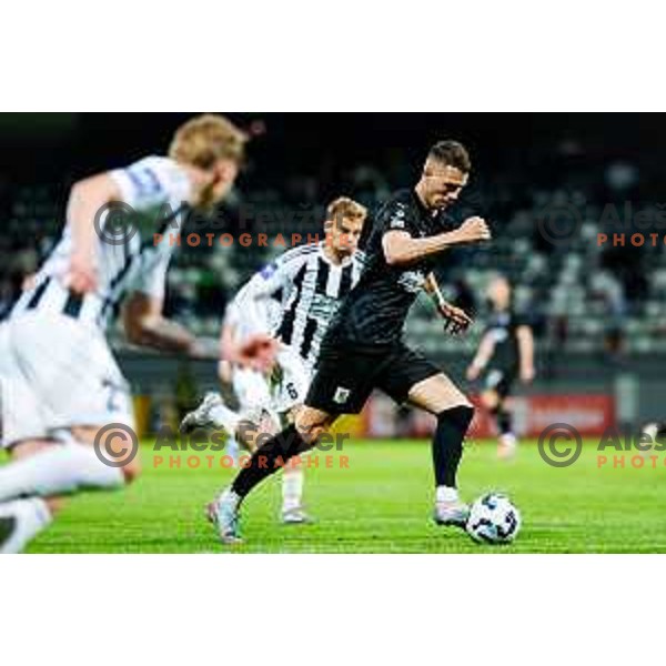 in action during Prva liga Telemach 2024/2025 football match between Mura and Olimpija in Murska Sobota, Slovenia on May 10, 2025