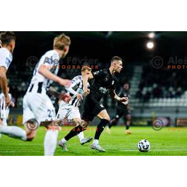 in action during Prva liga Telemach 2024/2025 football match between Mura and Olimpija in Murska Sobota, Slovenia on May 10, 2025