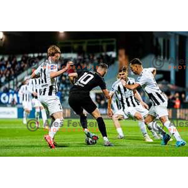 in action during Prva liga Telemach 2024/2025 football match between Mura and Olimpija in Murska Sobota, Slovenia on May 10, 2025