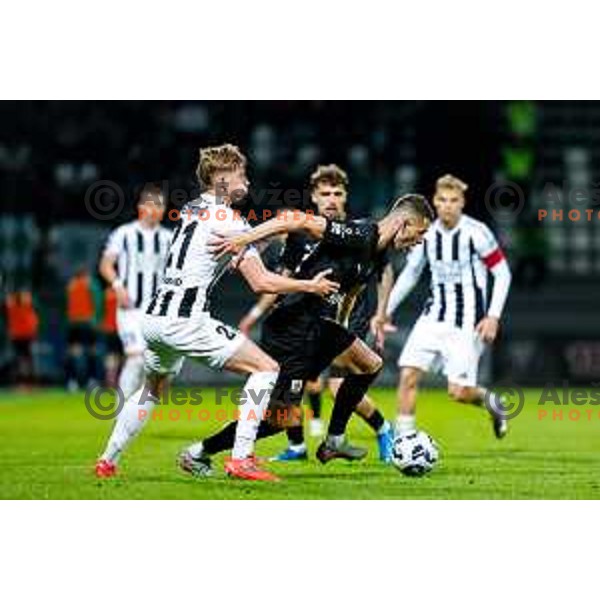 in action during Prva liga Telemach 2024/2025 football match between Mura and Olimpija in Murska Sobota, Slovenia on May 10, 2025