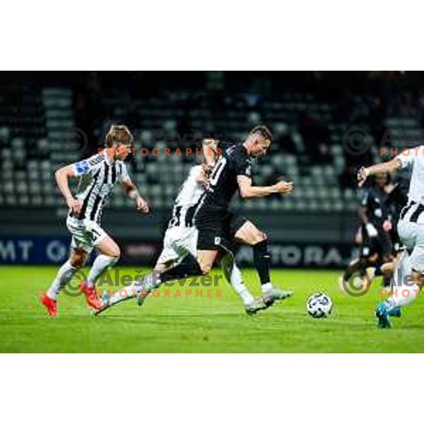 in action during Prva liga Telemach 2024/2025 football match between Mura and Olimpija in Murska Sobota, Slovenia on May 10, 2025