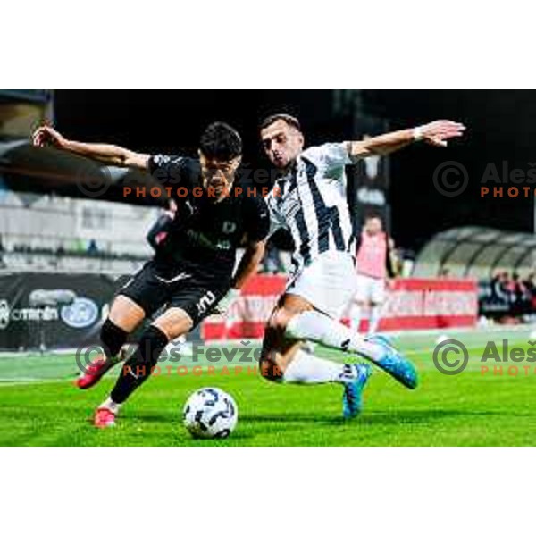 in action during Prva liga Telemach 2024/2025 football match between Mura and Olimpija in Murska Sobota, Slovenia on May 10, 2025