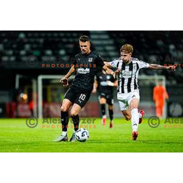 in action during Prva liga Telemach 2024/2025 football match between Mura and Olimpija in Murska Sobota, Slovenia on May 10, 2025