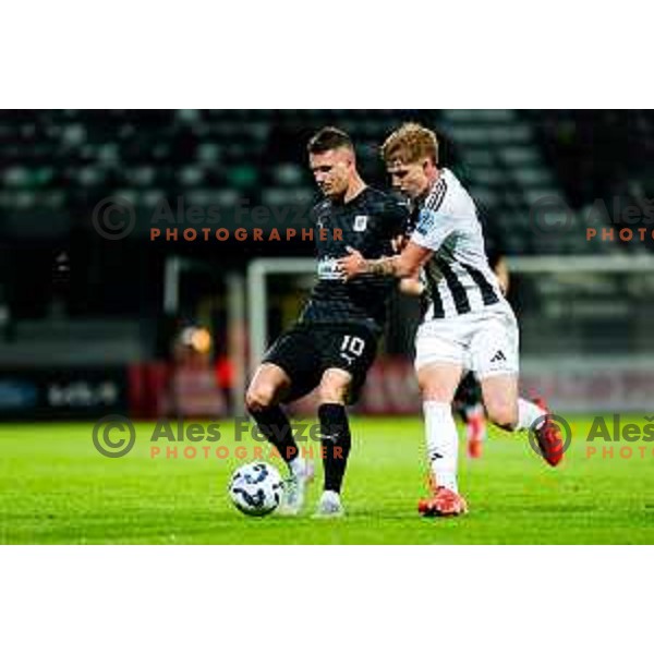 in action during Prva liga Telemach 2024/2025 football match between Mura and Olimpija in Murska Sobota, Slovenia on May 10, 2025