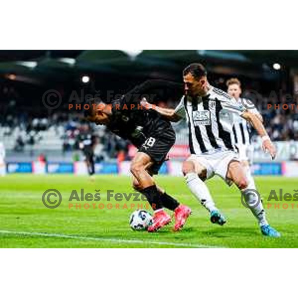 in action during Prva liga Telemach 2024/2025 football match between Mura and Olimpija in Murska Sobota, Slovenia on May 10, 2025