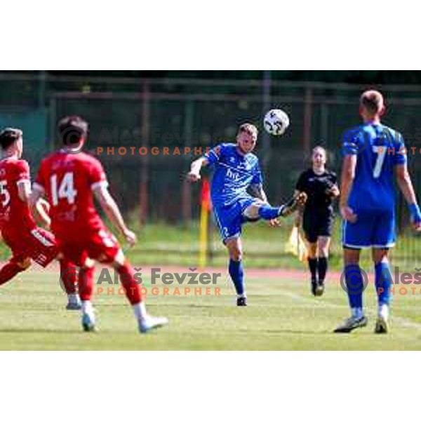 in action during 2.SNL 2024/2025 football match between Slovan and Gorica in Ljubljana, Slovenia on May 11, 2025