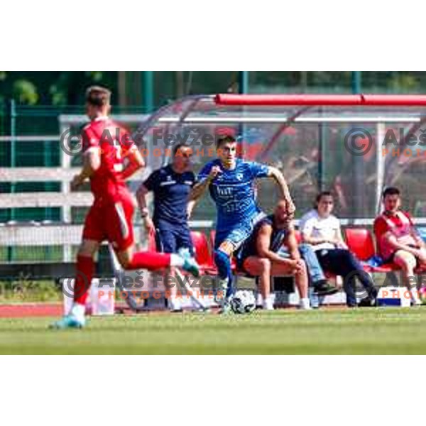 in action during 2.SNL 2024/2025 football match between Slovan and Gorica in Ljubljana, Slovenia on May 11, 2025