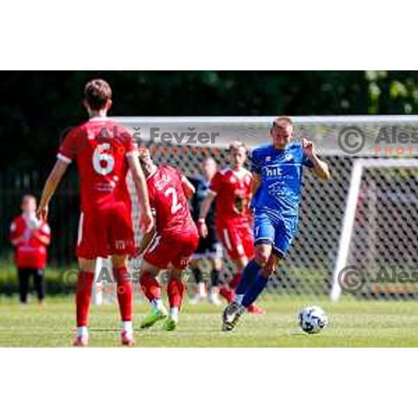 in action during 2.SNL 2024/2025 football match between Slovan and Gorica in Ljubljana, Slovenia on May 11, 2025