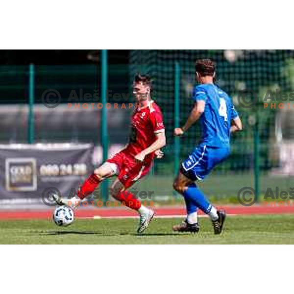 in action during 2.SNL 2024/2025 football match between Slovan and Gorica in Ljubljana, Slovenia on May 11, 2025