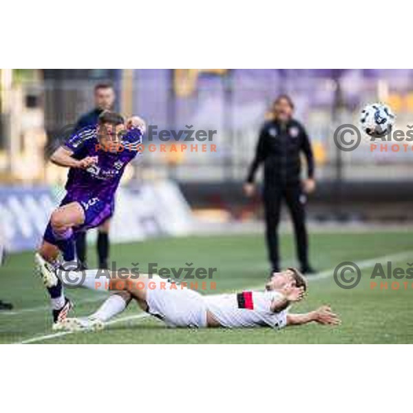 Pijus Sirvys vs Alexander Stozinic in action during Prva liga Telemach football match between Maribor and Primorje in Ljudski vrt, Maribor, Slovenia on May 11, 2025. Photo: Jure Banfi