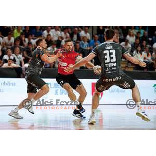 Gašper Hrastnik of RD LL Grosist Slovan in action during First match of Semi-finals of NLB League 2024/2025 between LL Grosist Slovan and Trimo Trebnje in Kodeljevo Hall, Ljubljana, Slovenia on May 17, 2025.