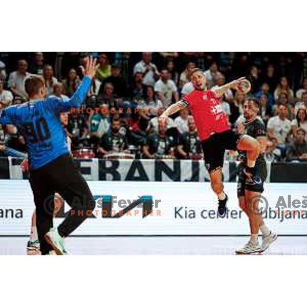 Gasper Hrastnik of RD LL Grosist Slovan in action during First match of Semi-finals of NLB League 2024/2025 between LL Grosist Slovan and Trimo Trebnje in Kodeljevo Hall, Ljubljana, Slovenia on May 17, 2025.