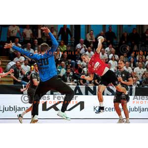 Gasper Hrastnik of RD LL Grosist Slovan in action during First match of Semi-finals of NLB League 2024/2025 between LL Grosist Slovan and Trimo Trebnje in Kodeljevo Hall, Ljubljana, Slovenia on May 17, 2025.