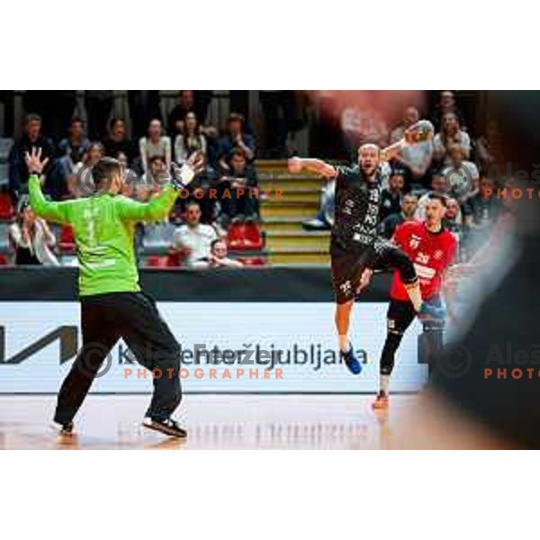 Timotej Grmsek of RK Trimo Trebnje in action during First match of Semi-finals of NLB League 2024/2025 between LL Grosist Slovan and Trimo Trebnje in Kodeljevo Hall, Ljubljana, Slovenia on May 17, 2025.