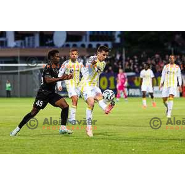 Isaac Matondo of FC Koper and Ziga Repas of NK Maribor in action during Prva liga Telemach 2024/2025 football match between Koper and Maribor in Koper, Slovenia on May 18, 2025 Photo: Grega Valancic
