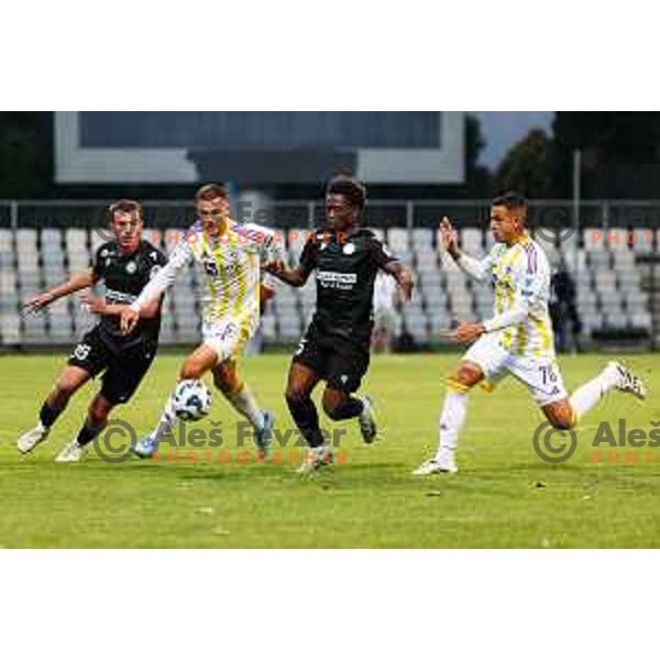 Di Mateo Lovric of FC Koper, Pijus Sirvys of NK Maribor, Isaac Matondo of FC Koper and Bartug Elmaz of NK Maribor in action during Prva liga Telemach 2024/2025 football match between Koper and Maribor in Koper, Slovenia on May 18, 2025 Photo: Grega Valancic