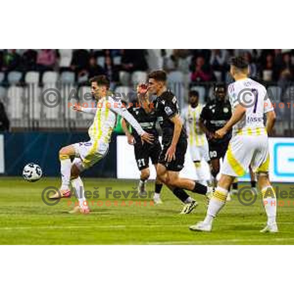 Ziga Repas of NK Maribor and Sandro Jovanovic of FC Koper in action during Prva liga Telemach 2024/2025 football match between Koper and Maribor in Koper, Slovenia on May 18, 2025 Photo: Grega Valancic