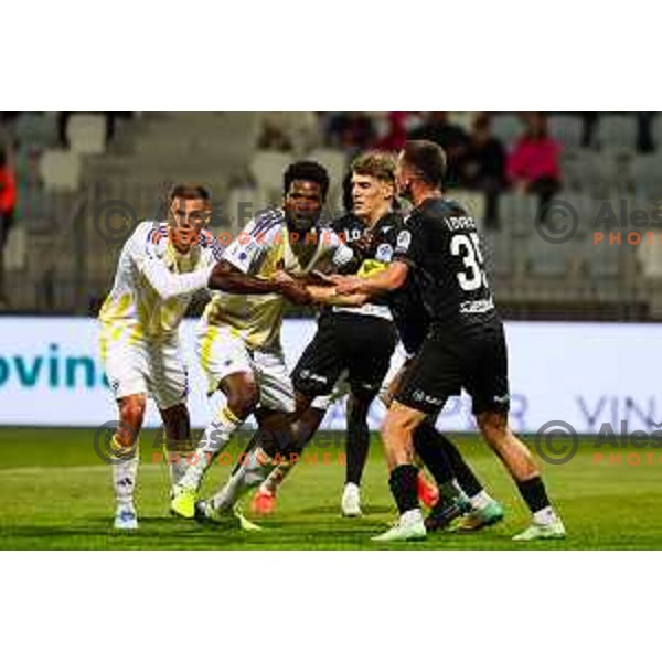 Benjamin Tetteh of NK Maribor vs Maj Mittendorfer of FC Koper in action during Prva liga Telemach 2024/2025 football match between Koper and Maribor in Koper, Slovenia on May 18, 2025 Photo: Grega Valancic