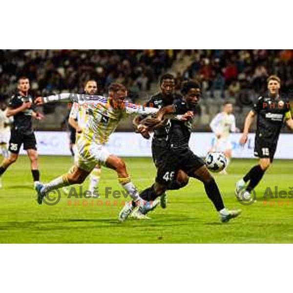 Pijus Sirvys of NK Maribor and Isaac Matondo of FC Koper in action during Prva liga Telemach 2024/2025 football match between Koper and Maribor in Koper, Slovenia on May 18, 2025 Photo: Grega Valancic