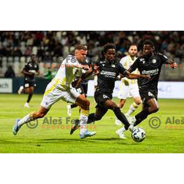 Pijus Sirvys of NK Maribor and Isaac Matondo of FC Koper in action during Prva liga Telemach 2024/2025 football match between Koper and Maribor in Koper, Slovenia on May 18, 2025 Photo: Grega Valancic
