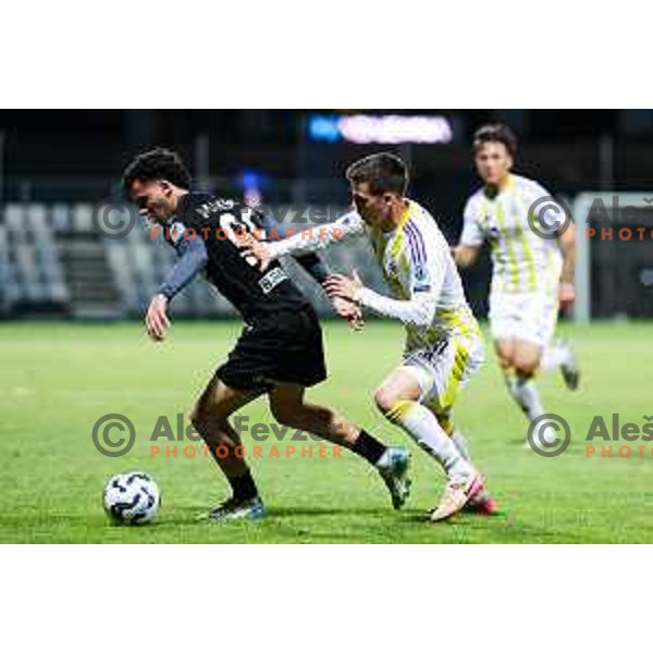 Kamil Manseri of FC Koper and Ziga Repas of NK Maribor in action during Prva liga Telemach 2024/2025 football match between Koper and Maribor in Koper, Slovenia on May 18, 2025 Photo: Grega Valancic