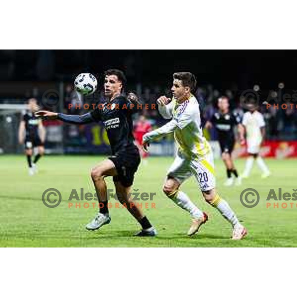 Kamil Manseri of FC Koper and Ziga Repas of NK Maribor in action during Prva liga Telemach 2024/2025 football match between Koper and Maribor in Koper, Slovenia on May 18, 2025 Photo: Grega Valancic