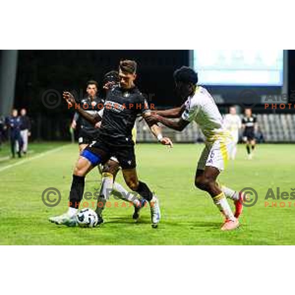Deni Juric of FC Koper and Bradley Hodillon Matufueni M\'Bondo of NK Maribor in action during Prva liga Telemach 2024/2025 football match between Koper and Maribor in Koper, Slovenia on May 18, 2025 Photo: Grega Valancic