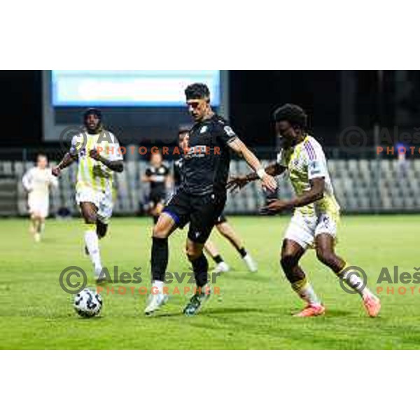 Deni Juric of FC Koper and Bradley Hodillon Matufueni M\'Bondo of NK Maribor in action during Prva liga Telemach 2024/2025 football match between Koper and Maribor in Koper, Slovenia on May 18, 2025 Photo: Grega Valancic