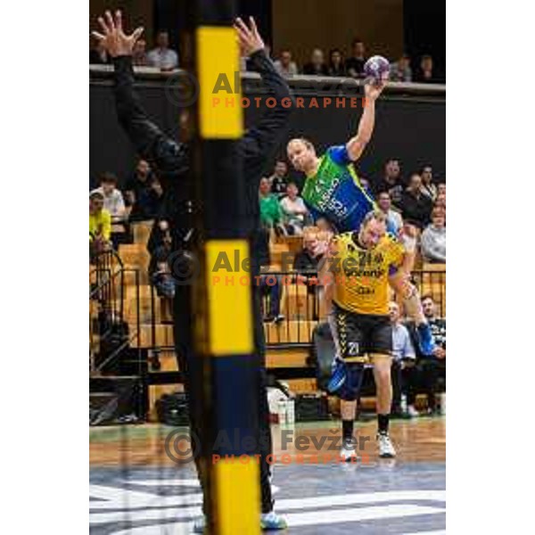 in action during second 1.NLB league semi-final handball match between Gorenje Velenje and Celje Pivovarna Lasko in Velenje, Slovenia on May 21, 2025.