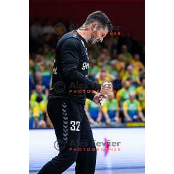 in action during second 1.NLB league semi-final handball match between Gorenje Velenje and Celje Pivovarna Lasko in Velenje, Slovenia on May 21, 2025.