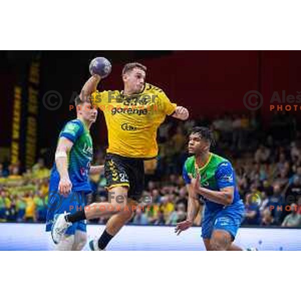 in action during second 1.NLB league semi-final handball match between Gorenje Velenje and Celje Pivovarna Lasko in Velenje, Slovenia on May 21, 2025.