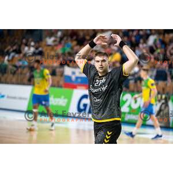 in action during third match of the semi-final of 1.NLB league handball match between Celje Pivovarna Lasko and Gorenje Velenje in Celje, Slovenia on May 24, 2025