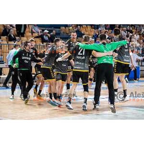 Players of Gorenje Velenje celebrate a victory in the third match of the semi-final of 1.NLB league handball match between Celje Pivovarna Lasko and Gorenje Velenje in Celje, Slovenia on May 24, 2025