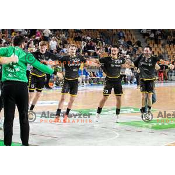 Players of Gorenje Velenje celebrate a victory in the third match of the semi-final of 1.NLB league handball match between Celje Pivovarna Lasko and Gorenje Velenje in Celje, Slovenia on May 24, 2025